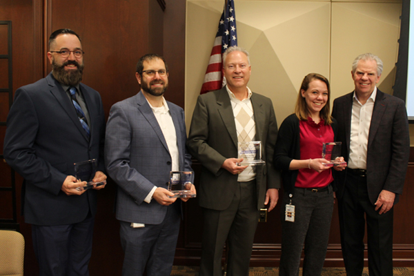 President and CEO Bill Spence and Peer-to-Peer Award Winners, Kevin Steinbacher, Matt Henry, Rob Hodge and Emily Haelsig