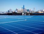 Rooftop solar panels with the New York City skyline in the background