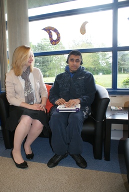 Western Power Distribution’s Jocelyn Meekums with Majid Hussain, a student at RNIB College Loughborough, listening to one of the new talking books.